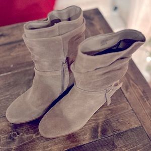 Violet and Red suede boots.